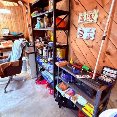 Sale Photo Thumbnail #105: various household goods, tools, cleaning supplies, and vintage Oklahoma memorabilia.