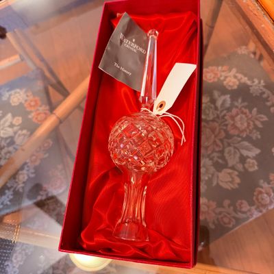 Sale Photo Thumbnail #14: Waterford Crystal Christmas tree topper with cut-glass pattern, presented in its original satin-lined red box with booklet