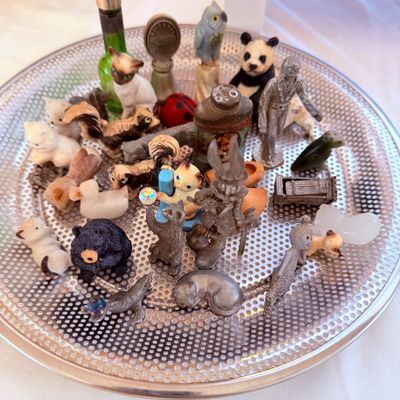 Sale Photo Thumbnail #10: Collection of vintage miniature figurines, including ceramic animals, pewter characters, and small novelty knick-knacks