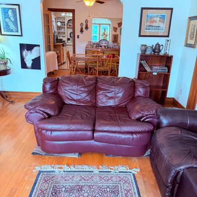 Sale Photo Thumbnail #22: Plum-colored leather loveseat