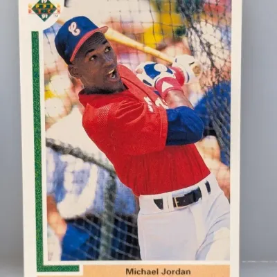 Sale Photo Thumbnail #888: 1991 Upper Deck Michael Jordan baseball rookie card #SP1, featuring him taking batting practice.