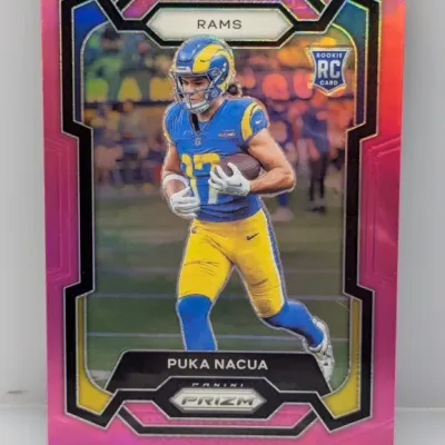 Sale Photo Thumbnail #558: 2023 Panini Prizm Puka Nacua Pink Prizm rookie football trading card in sharp condition.