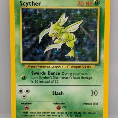 Sale Photo Thumbnail #82: 1999 Pokémon Jungle Set Scyther holo trading card, #10/64, featuring illustration by Ken Sugimori.