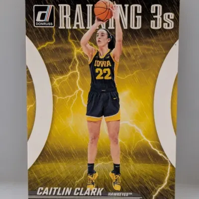 Sale Photo Thumbnail #742: Panini Donruss "Raining 3s" Caitlin Clark Iowa Hawkeyes trading card in excellent condition.