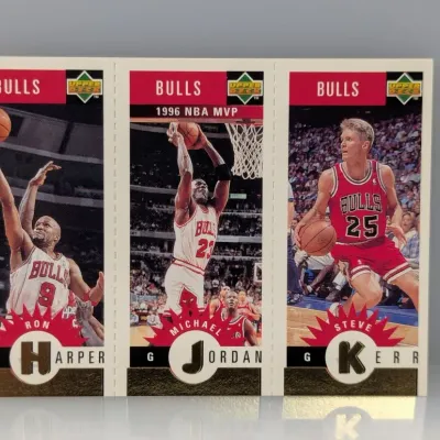 Sale Photo Thumbnail #539: 1996 Upper Deck Chicago Bulls 3-card panel featuring Ron Harper, Michael Jordan, and Steve Kerr.