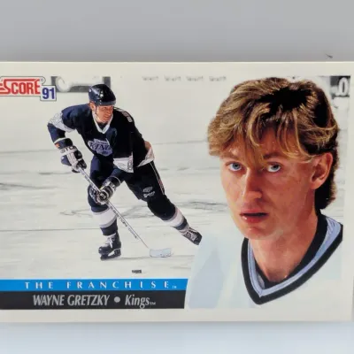 Sale Photo Thumbnail #727: 1991 Score Wayne Gretzky 'The Franchise' hockey trading card (#0) featuring him with the Los Angeles Kings.