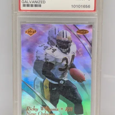 Sale Photo Thumbnail #150: PSA-graded 9 Mint 1999 Collector's Edge Masters Galvanized Ricky Williams rookie trading card #120 in a protective slab.