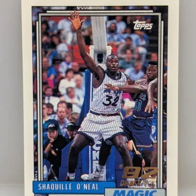 Sale Photo Thumbnail #124: 1992–93 Topps Shaquille O'Neal #362 draft pick rookie basketball card featuring the Orlando Magic, in good condition with sharp corners.