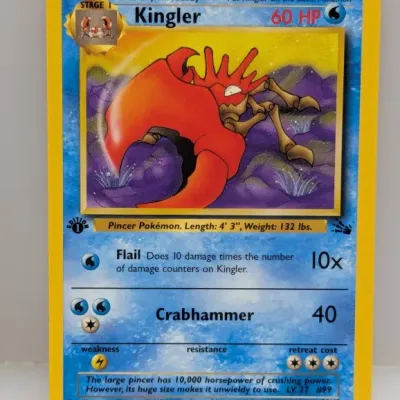 Sale Photo Thumbnail #784: 1st Edition Kingler 38/62 Pokémon card from the 1999 Fossil set, featuring 3D cut-out shadowbox artwork.