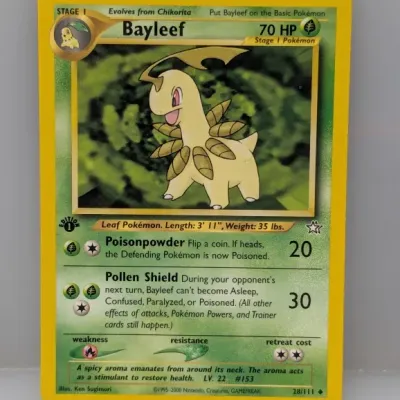 Sale Photo Thumbnail #828: Pokemon Bayleef 1st Edition trading card from the Neo Genesis expansion set, numbered 28/111, circa 2000.