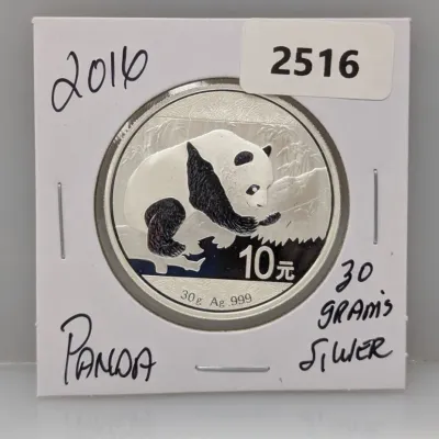 Sale Photo Thumbnail #1007: 2016 Chinese Silver Panda 10 Yuan coin, 30 grams of .999 fine silver, displayed in a cardboard coin flip holder.