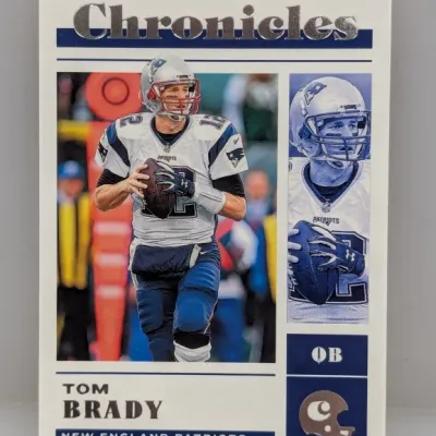 Sale Photo Thumbnail #939: Panini Chronicles Tom Brady New England Patriots football card featuring a foil logo detail.