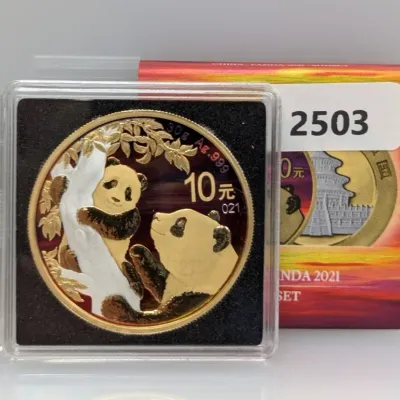Sale Photo Thumbnail #994: 2021 Chinese Silver Panda 10 Yuan coin in a colorized sunset edition, presented in its clear protective capsule with original box.