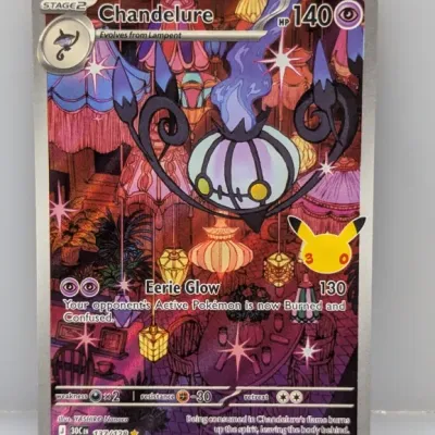 Sale Photo Thumbnail #759: Pokémon TCG Chandelure full-art card from the 25th Anniversary Celebrations collection, featuring YASHIRO Nanaco artwork.