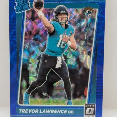 Sale Photo Thumbnail #583: 2021 Donruss Optic Trevor Lawrence Rated Rookie sports trading card featuring a blue scope parallel finish.