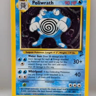 Sale Photo Thumbnail #752: Holographic Poliwrath #15/130 Pokémon trading card from the Base Set 2 release, circa 2000.