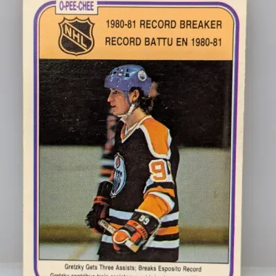 Sale Photo Thumbnail #300: 1981-82 O-Pee-Chee Wayne Gretzky Record Breaker hockey card, #106. Features Gretzky in his Edmonton Oilers uniform celebrating his 1980-81 record-breaking season.