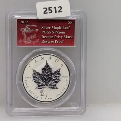Sale Photo Thumbnail #1003: 2012 Canada $5 Silver Maple Leaf coin with Dragon Privy Mark, PCGS graded SP Gem Reverse Proof in a protective slab.