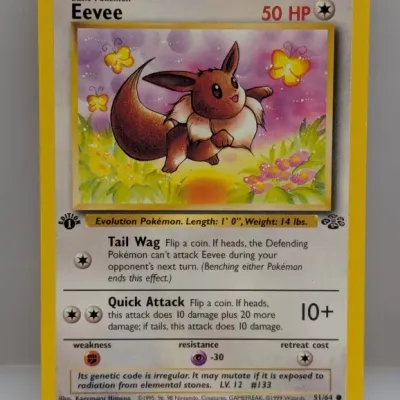 Sale Photo Thumbnail #673: 1st Edition Eevee #51/64 Pokémon trading card from the 1999 Jungle set, illustrated by Kagemaru Himeno.