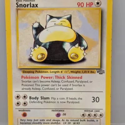 Sale Photo Thumbnail #370: Vintage 1999 Snorlax Jungle set Pokémon trading card, number 27/64.