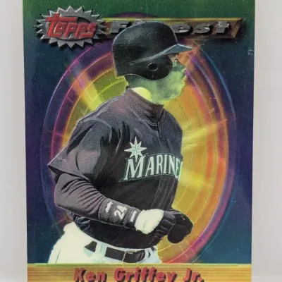 Sale Photo Thumbnail #207: 1997 Topps Finest Ken Griffey Jr. trading card (#100) featuring a refractor-style finish.