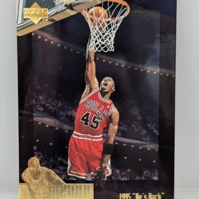 Sale Photo Thumbnail #372: 1995 Upper Deck Michael Jordan 'He's Back' basketball card, featuring number 45 in a Chicago Bulls jersey.