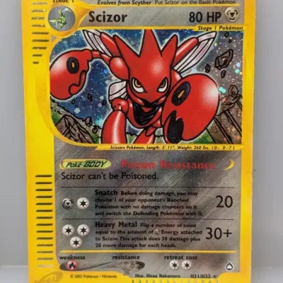 Sale Photo Thumbnail #88: 2002 Pokémon Scizor holofoil trading card from the Aquapolis e-Reader series, numbered H21/H32.