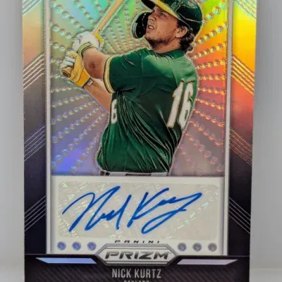 Sale Photo Thumbnail #363: Panini Prizm baseball trading card featuring an autographed insert of Nick Kurtz in an Oakland Athletics uniform.