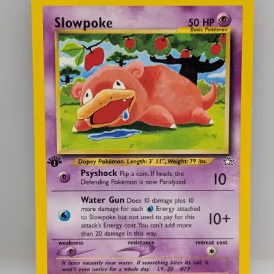 Sale Photo Thumbnail #816: 1st Edition Slowpoke Pokémon card (#73/111) from the Neo Genesis expansion set, released in 2000.