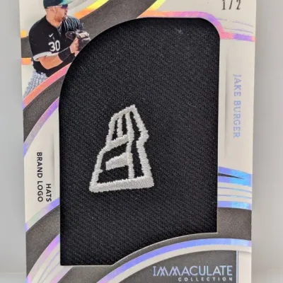 Sale Photo Thumbnail #326: Panini Immaculate Collection Jake Burger Hats Brand Logo relic baseball trading card, limited edition 1/2.