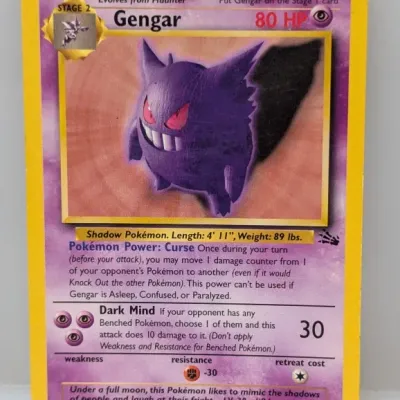 Sale Photo Thumbnail #362: Vintage Pokémon Gengar trading card from the 1999 Fossil set, numbered 20/62, featuring Keiji Kinebuchi artwork.
