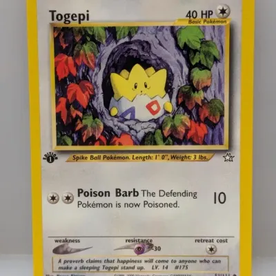 Sale Photo Thumbnail #667: Pokemon Neo Genesis 1st Edition Togepi #51/111 trading card from 2000.