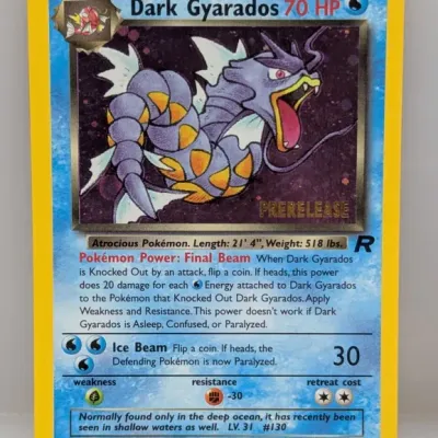 Sale Photo Thumbnail #194: Vintage Pokémon Dark Gyarados 8/82 Prerelease holographic trading card from the Team Rocket set, circa 2000.