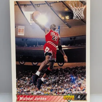 Sale Photo Thumbnail #420: 1992-93 Upper Deck Michael Jordan basketball trading card #23, featuring an action shot of Jordan driving to the hoop.