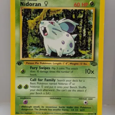 Sale Photo Thumbnail #780: 1st Edition Jungle set Nidoran female Pokémon trading card (57/64), illustrated by Ken Sugimori and released by Wizards of the Coast in 1999.