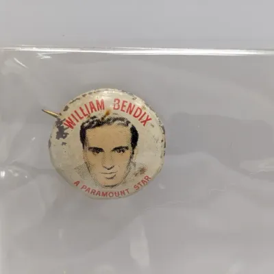 Sale Photo Thumbnail #53: Vintage William Bendix Paramount Star promotional pinback button, featuring a portrait and red lettering.