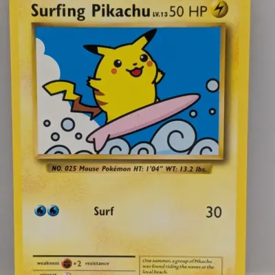 Sale Photo Thumbnail #338: 2016 Pokémon XY Evolutions Surfing Pikachu secret rare trading card (#111/108) illustrated by Toshinao Aoki.