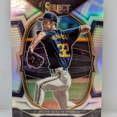 Sale Photo Thumbnail #391: 2023 Panini Select Jacob Misiorowski silver Prizm baseball trading card featuring the Milwaukee prospect in mid-throw, shown in excellent condition.