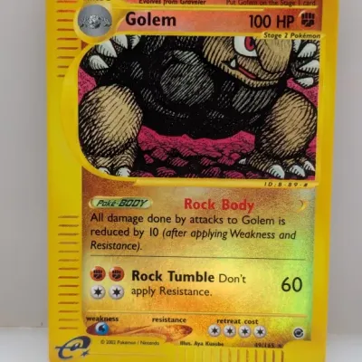 Sale Photo Thumbnail #424: 2002 Pokémon Expedition Base Set reverse holo Golem trading card (#49/165) illustrated by Aya Kusube.