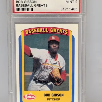 Sale Photo Thumbnail #89: PSA-graded 1990 Swell Baseball Greats Bob Gibson trading card (#120) in Mint 9 condition.