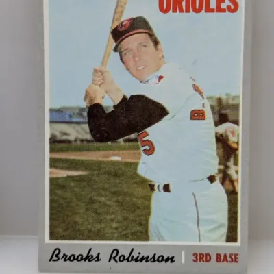 Sale Photo Thumbnail #744: Vintage Topps Brooks Robinson Baltimore Orioles baseball card, depicting the third baseman in a batting stance.