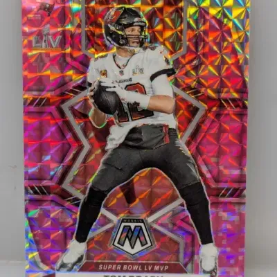 Sale Photo Thumbnail #876: Panini Mosaic Tom Brady Super Bowl LV MVP pink geometric Prizm trading card in mint condition.