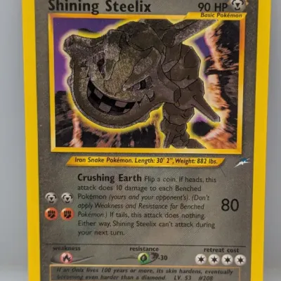 Sale Photo Thumbnail #292: Shining Steelix Pokémon trading card, #112/105, from the Neo Destiny expansion set, released in 2002.