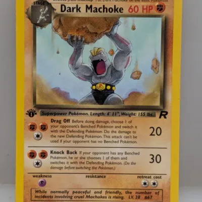 Sale Photo Thumbnail #692: 1st Edition Dark Machoke Pokémon trading card (40/82) from the Team Rocket set, illustrated by Mitsuhiro Arita, circa 2000.