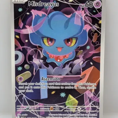 Sale Photo Thumbnail #714: Misdreavus full-art secret rare Pokémon trading card #233/217 from the Paldea Evolved set, in near-mint condition.