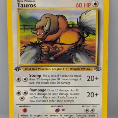 Sale Photo Thumbnail #562: 1st Edition Tauros 47/64 Pokémon card from the 1999 Jungle expansion set by Wizards of the Coast.