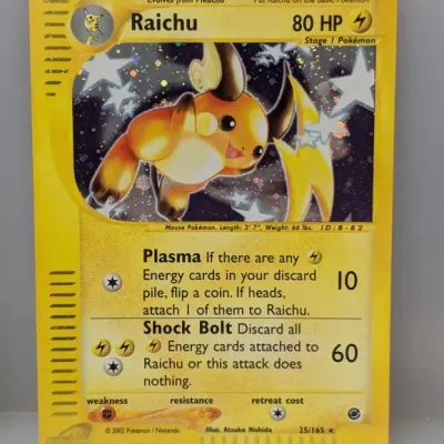 Sale Photo Thumbnail #104: 2002 Pokémon Expedition Base Set holographic Raichu card (#25/165), illustrated by Atsuko Nishida.