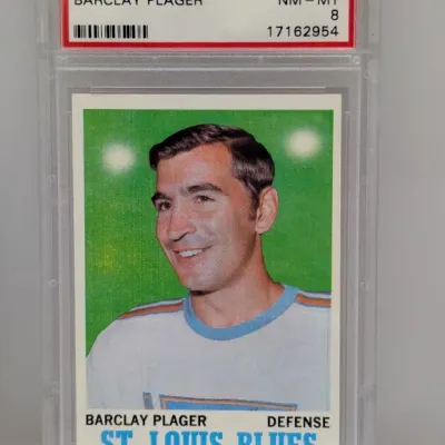 Sale Photo Thumbnail #185: 1970 Topps Barclay Plager hockey trading card #99, graded PSA NM-MT 8.