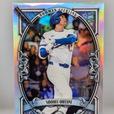 Sale Photo Thumbnail #885: Bowman Sterling Shohei Ohtani refractors trading card in excellent condition, featuring an ornate frame design.
