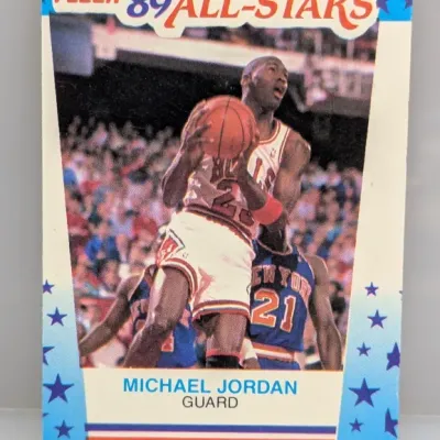 Sale Photo Thumbnail #931: 1989 Fleer All-Stars Michael Jordan basketball card #3, featuring a blue star-patterned border.